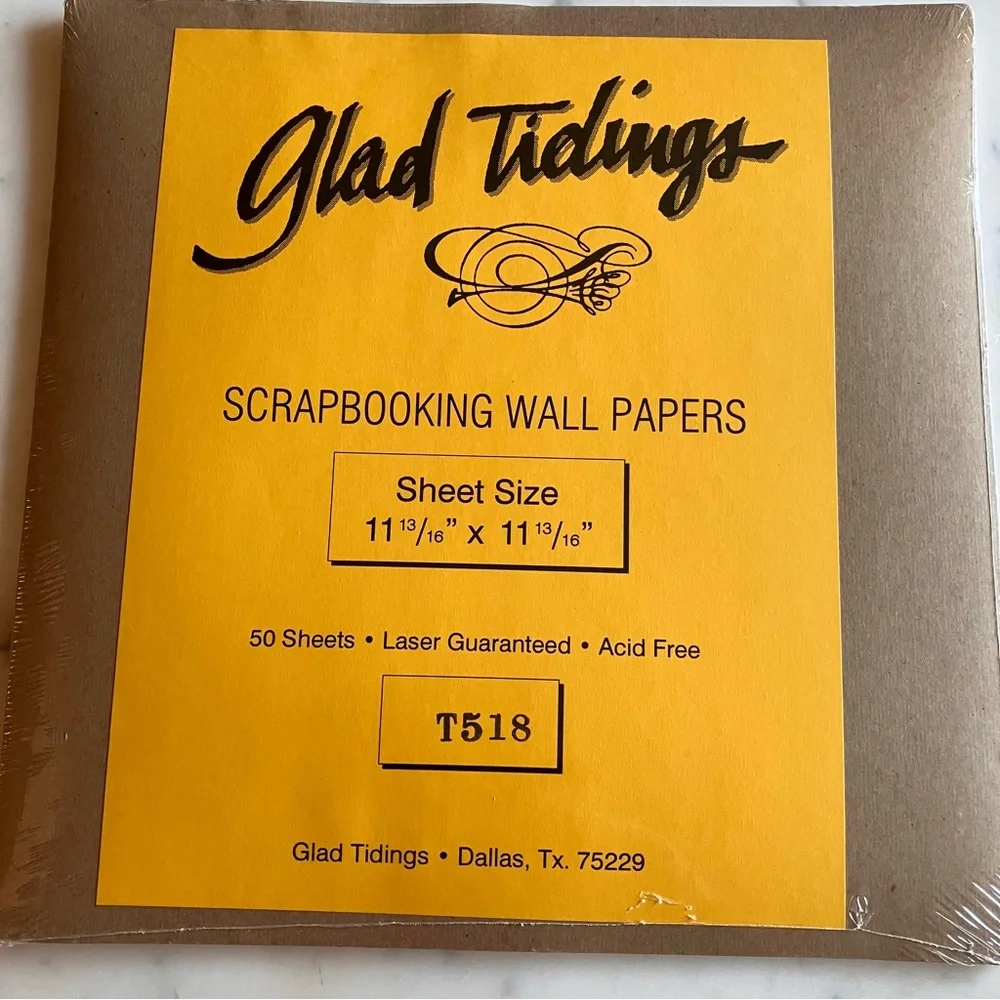 50 pages of 11 13/16”‎ x 11 13/16” Scrapbook paper with coordinating stickers